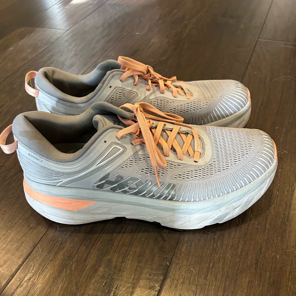 Hoka’s Women’s Size 10.5 Gently Used. Grey and peachy pink.